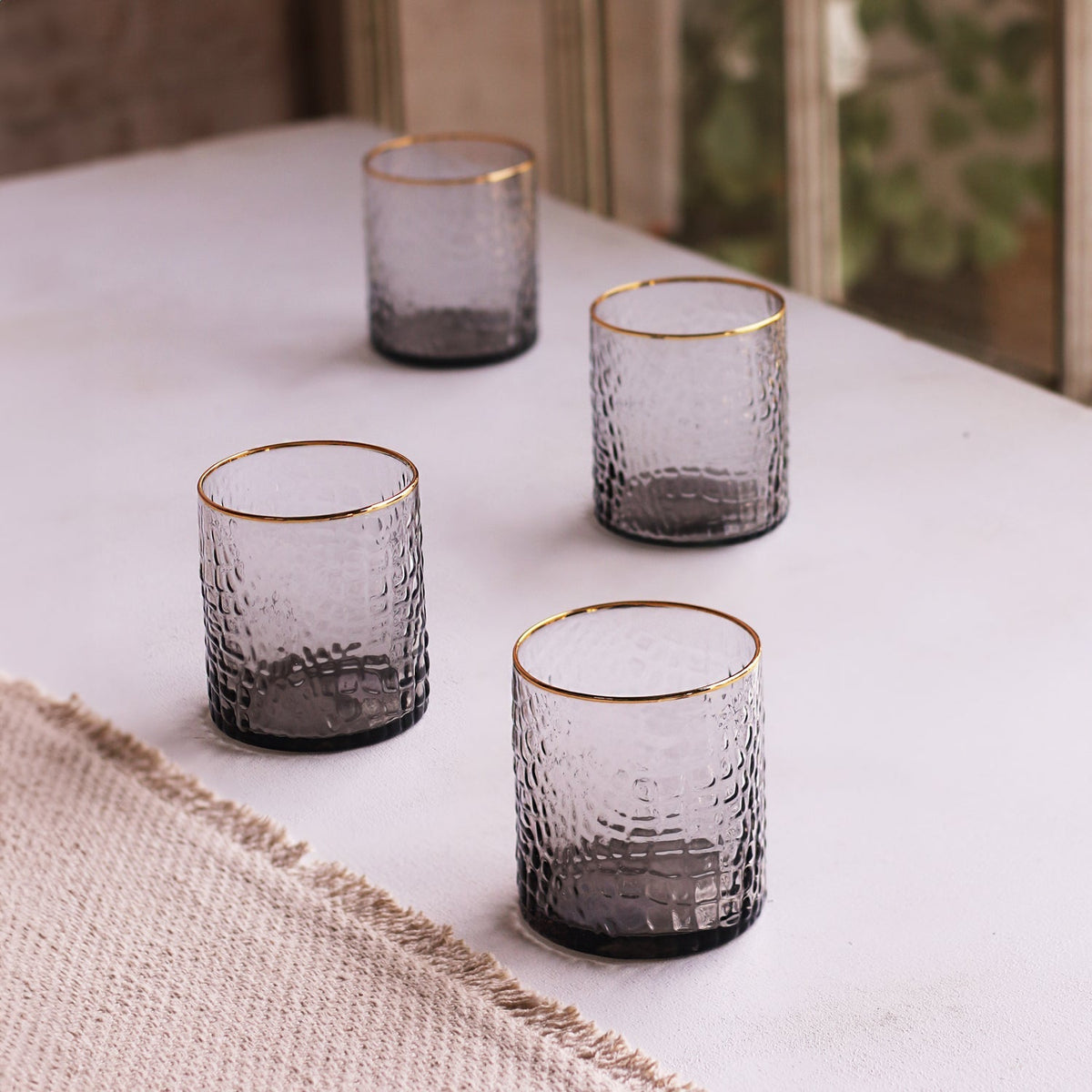 beatriz-ball-wholesale-glass-croc-double-old-fashioned-with-gold-rim-set-of-4-smoke-grey