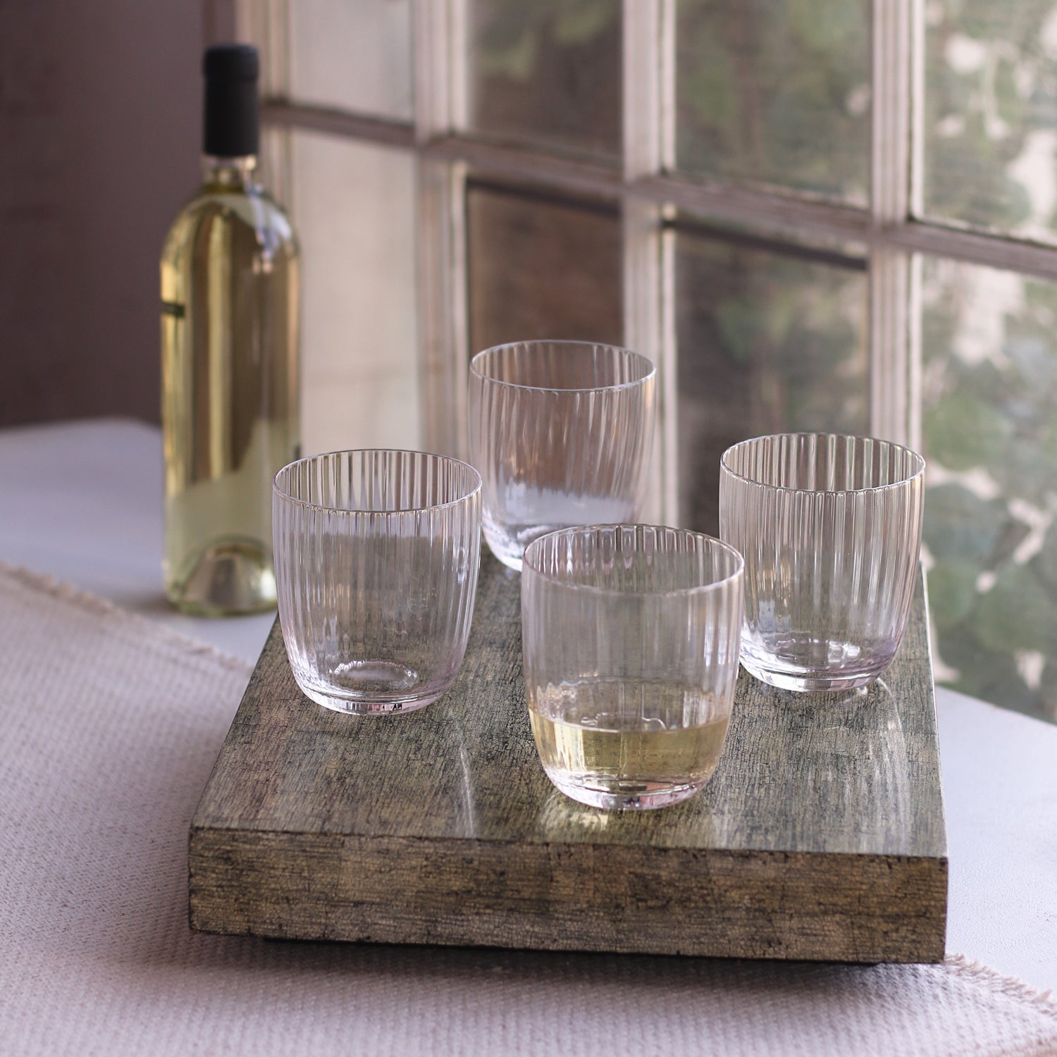 beatriz-ball-wholesale-glass-audrey-stemless-flute-with-gold-rim-set-of-4-clear-and-gold